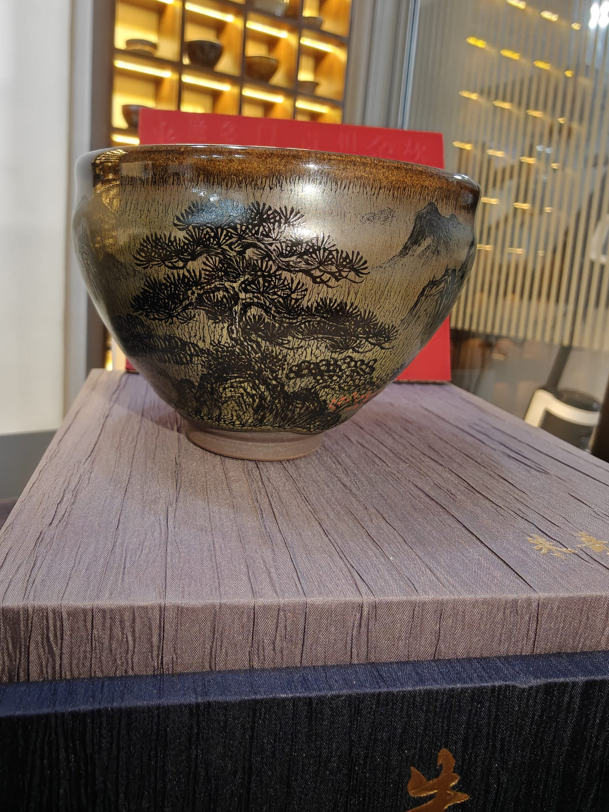 Mountain landscape JianZhan tea bowl showing pine tree and peaks