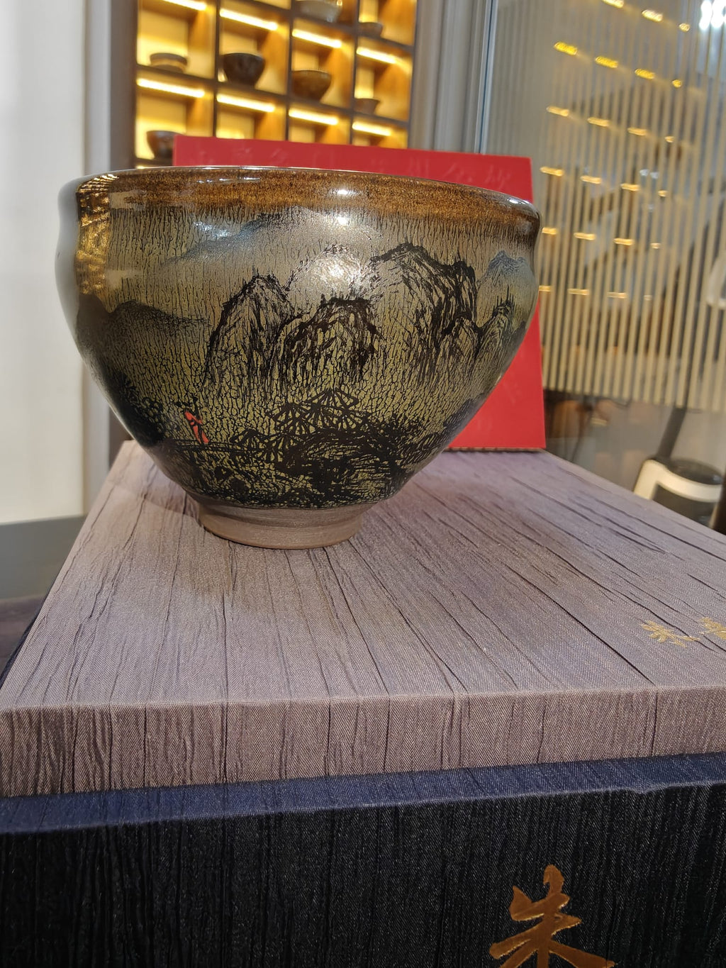 Mountain landscape JianZhan tea bowl showing willow and mountain scene